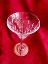 Elegant Vintage Cut Crystal Glass Stemware on Red Background Royalty Free Stock Photo