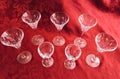 Elegant Vintage Cut Crystal Glass Stemware on Red Background