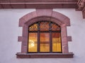 Elegant vintage house window, lights on