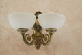 Elegant vintage wall lamp with bronze or brass finish Royalty Free Stock Photo