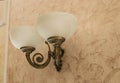 Elegant vintage wall lamp with bronze or brass finish Royalty Free Stock Photo