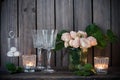 Elegant vintage wedding table decoration with roses and candles Royalty Free Stock Photo