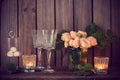 Elegant vintage wedding table decoration with roses and candles Royalty Free Stock Photo