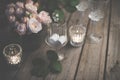 Elegant vintage wedding table decoration with roses and candles Royalty Free Stock Photo