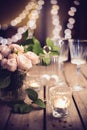 Elegant vintage wedding table decoration with roses and candles Royalty Free Stock Photo