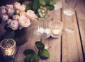 Elegant vintage wedding table decoration with roses and candles Royalty Free Stock Photo