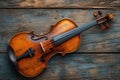Elegant violin resting on a vintage wooden table, evoking classical music vibes Royalty Free Stock Photo
