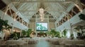Elegant Wedding Reception Hall Decor with Palm Trees on Screen Royalty Free Stock Photo