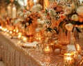 Elegant Wedding Reception Table Setting with Floral Arrangements and Candlelight Ambiance Royalty Free Stock Photo