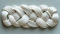 Elegant White Braided Design with Smooth Strands on a Soft Background for Artistic Projects Royalty Free Stock Photo