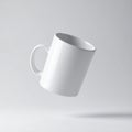Elegant White Ceramic Mug Floating in a White Background with Soft Shadows Mock Up Royalty Free Stock Photo