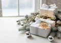White Christmas Gifts by Window AI generated Royalty Free Stock Photo