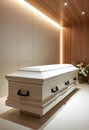 Elegant white coffin displayed in a modern funeral home interior Royalty Free Stock Photo