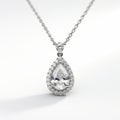 Elegant White Diamond Pear Shaped Pendant With Diamond Halo