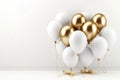 Elegant white and gold balloon decoration for festive celebrations on a pure white background