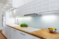 Elegant white kitchen with led lights Royalty Free Stock Photo