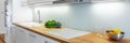 Elegant white kitchen with led lights, panorama Royalty Free Stock Photo