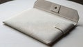 Elegant White Laptop Sleeve on a White Surface Royalty Free Stock Photo