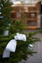 Elegant White Ribbon Closeup on Christmas Tree