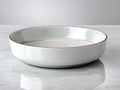 Elegant white serving bowl on a marble surface Royalty Free Stock Photo