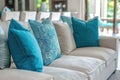 Elegant White Sofa with Blue Cushions and Natural Light Royalty Free Stock Photo