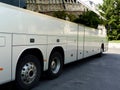 White tour bus with dark windows reflecting the castle building in Budapest Royalty Free Stock Photo