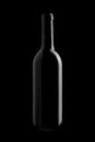 Elegant wine bottle in black background Royalty Free Stock Photo