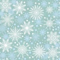 Elegant winter blue seamless pattern with various snowflake icons. Beautiful Christmas, New Year backdrop