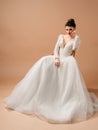 Elegant winter wedding dress with front slit long tulle skirt and french lace.