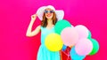 Elegant woman with an air colorful balloons is having fun Royalty Free Stock Photo