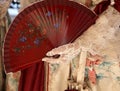 elegant woman with an ancient ceremonial dress and the fan in he Royalty Free Stock Photo