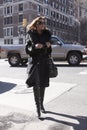 An elegant woman arriving to a Fashion show in New York