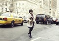 An elegant woman arriving to a Fashion show in New York