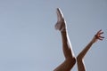 Elegant woman ballerina dancer isolated on grey background