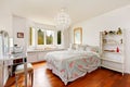 Elegant woman bedroom interior with dressing table and sitting space Royalty Free Stock Photo