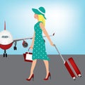 Elegant woman carrying a suitcase Royalty Free Stock Photo