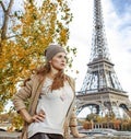 Elegant woman embankment in Paris looking into distance Royalty Free Stock Photo