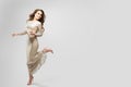 Elegant Woman Evening Sparkling Dress, Happy Fashion Model in beautiful Gown, Beauty Studio Portrait Royalty Free Stock Photo