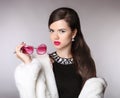 Elegant woman with fashion sunglasses, luxury jewelry, makeup, h Royalty Free Stock Photo