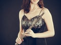 Elegant woman with flute instrument.