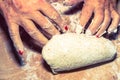 Elegant woman hands kneading and massaging homemade bread dough Royalty Free Stock Photo