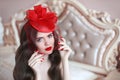 Elegant woman in retro hat with red lips and manicured nails. Br Royalty Free Stock Photo