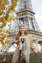 Elegant woman taking selfie using selfie stick in Paris, France Royalty Free Stock Photo