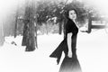 Elegant Woman Walking in Snow