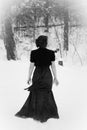 Elegant Woman Walking in Snow