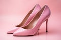 Elegant women's shoes made of pink leather on a pink background. Women's shoes, side view. Royalty Free Stock Photo