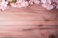 Elegant Wood Texture Background Adorned with Soft Pink Cherry Blossoms