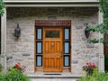 Elegant wooden front door with lion knocker