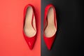 Elegant worn red shoes on a black-red background. Lifestyle. Everyday life woman