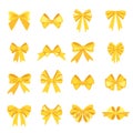 Elegant yellow bows from a wide ribbon. Decor for greeting cards